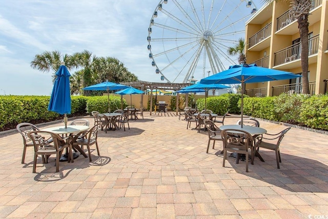 1200 N Ocean Blvd N Unit 905, Myrtle Beach, SC 29577 - view of patio / terrace featuring outdoor dining space