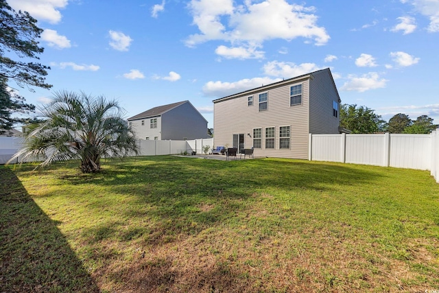 650 Woodman Dr, Conway, SC 29526 - back of property featuring a fenced backyard and a patio area