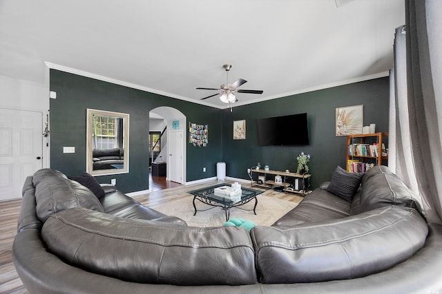 650 Woodman Dr, Conway, SC 29526 - living area with wood finished floors, arched walkways, a ceiling fan, and crown molding