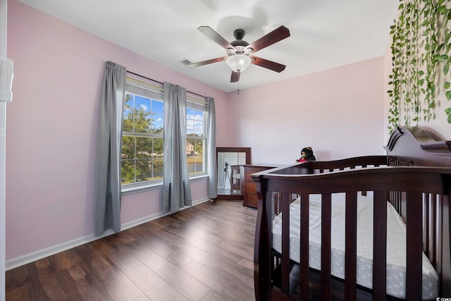 650 Woodman Dr, Conway, SC 29526 - bedroom with wood finished floors and a ceiling fan