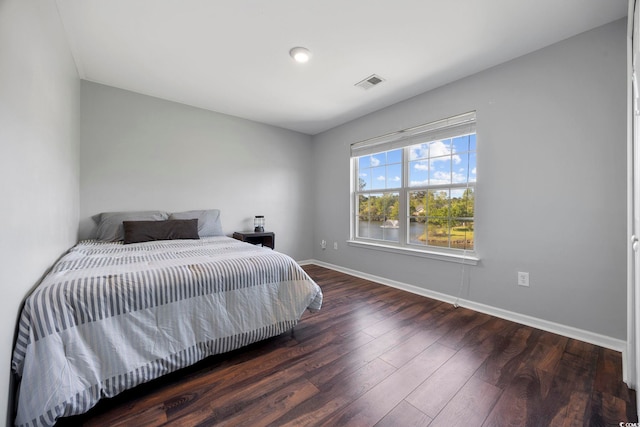 650 Woodman Dr, Conway, SC 29526 - bedroom with wood finished floors and baseboards