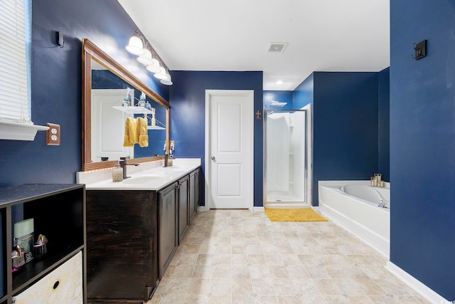 650 Woodman Dr, Conway, SC 29526 - bathroom with a garden tub, a shower stall, and double vanity