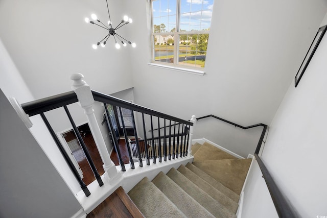 650 Woodman Dr, Conway, SC 29526 - stairs with a chandelier and a high ceiling