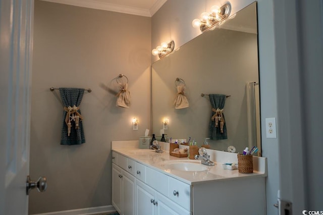 full bath featuring ornamental molding and double vanity