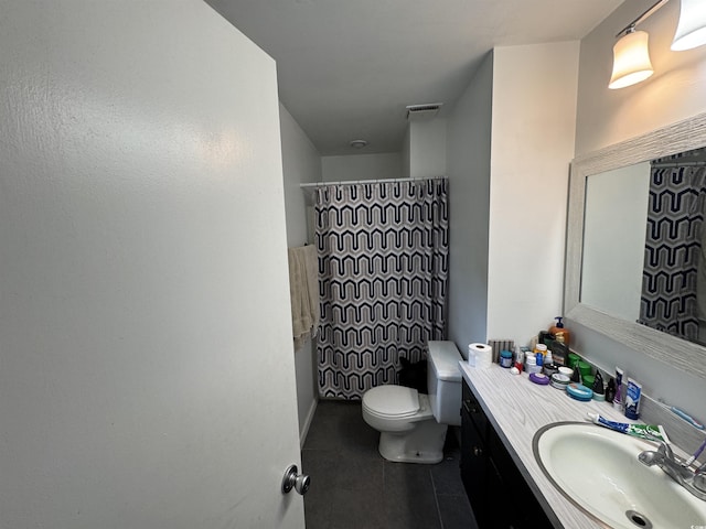 bathroom featuring vanity, a shower with curtain, toilet, tile patterned flooring, and visible vents