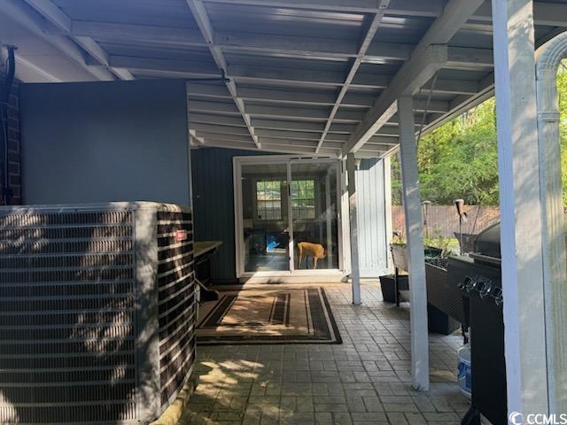 view of patio / terrace featuring cooling unit