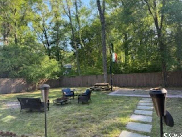view of yard featuring fence
