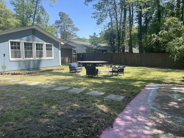 view of yard featuring fence