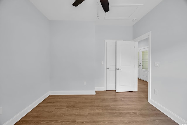 5132 Little River Neck Rd, North Myrtle Beach, SC 29582 - unfurnished bedroom with baseboards, ceiling fan, and wood finished floors