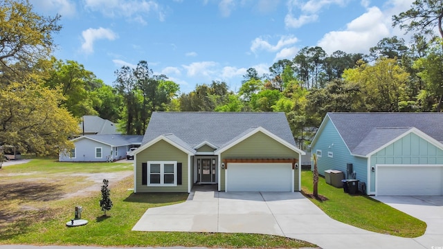 5132 Little River Neck Rd, North Myrtle Beach, SC 29582 - ranch-style house featuring driveway, a garage, a front yard, board and batten siding, and a shingled roof