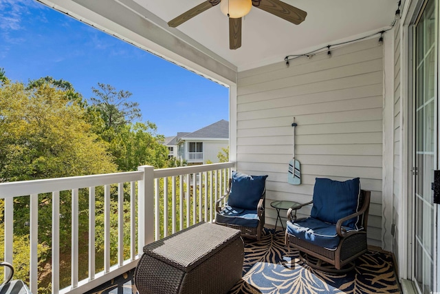 balcony featuring a ceiling fan