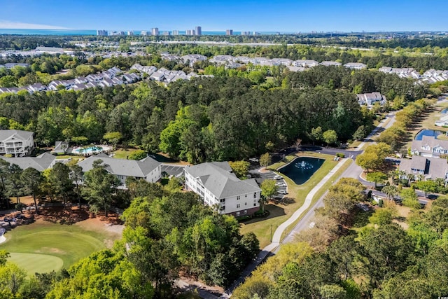 view of property location featuring nearby suburban area and a golf club