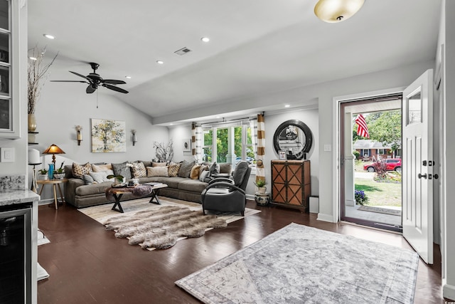 living area featuring vaulted ceiling, ceiling fan, dark wood-style floors, recessed lighting, and baseboards
