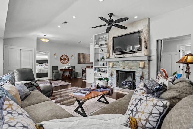 living room featuring ceiling fan, wood finished floors, recessed lighting, and a fireplace