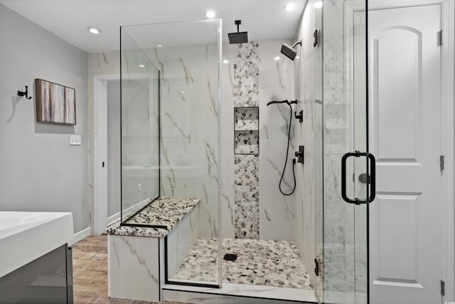 710 Yucca Ave, Myrtle Beach, SC 29577 - bathroom with a marble finish shower, recessed lighting, wood finished floors, and baseboards