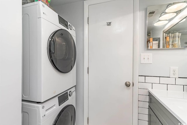 6100 N Ocean Blvd Unit 804, North Myrtle Beach, SC 29582 - washroom featuring estacked washer and dryer