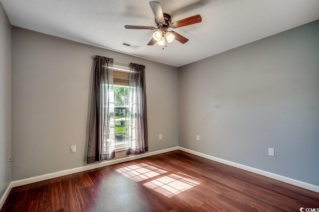 1154 Lampwick Ln, Murrells Inlet, SC 29576 - spare room featuring wood finished floors, a ceiling fan, and baseboards