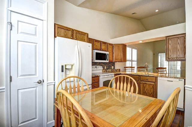 2705 S Key Largo Cir, Myrtle Beach, SC 29577 - dining room featuring vaulted ceiling and recessed lighting