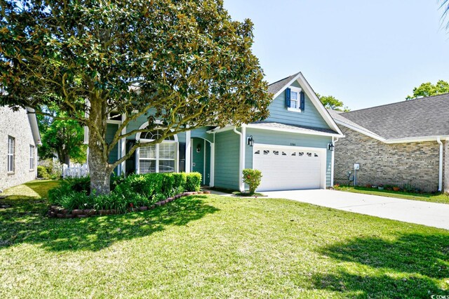 2705 S Key Largo Cir, Myrtle Beach, SC 29577 - view of front facade featuring an attached garage, driveway, and a front yard