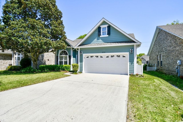 2705 S Key Largo Cir, Myrtle Beach, SC 29577 - view of front of property featuring a garage, a front yard, and concrete driveway