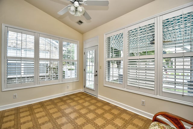 2705 S Key Largo Cir, Myrtle Beach, SC 29577 - unfurnished sunroom with healthy amount of natural light, lofted ceiling, and baseboards