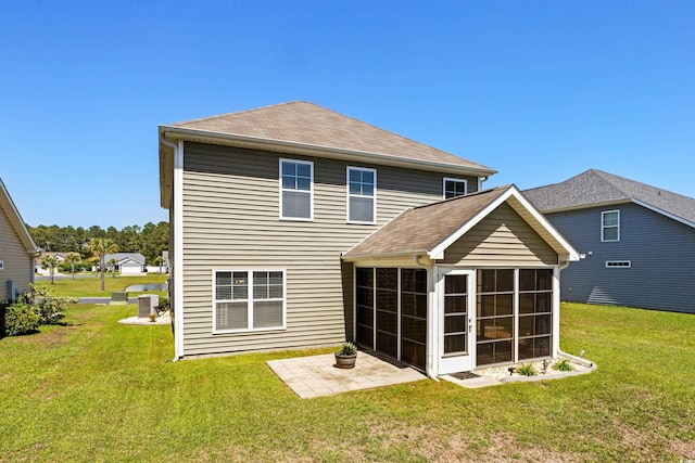 356 Whipple Run Loop, Myrtle Beach, SC 29588 - rear view of house with a sunroom, a yard, and a patio area