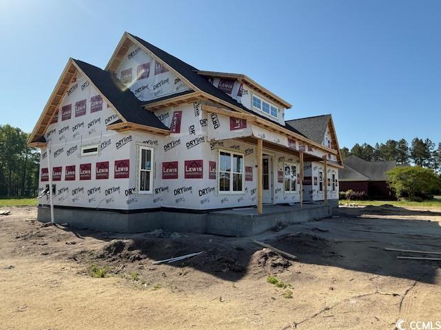 property in mid-construction featuring a porch