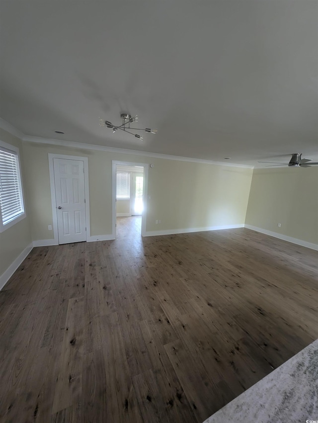 880 Briarwood Dr, Myrtle Beach, SC 29572 - unfurnished living room featuring ornamental molding and wood finished floors