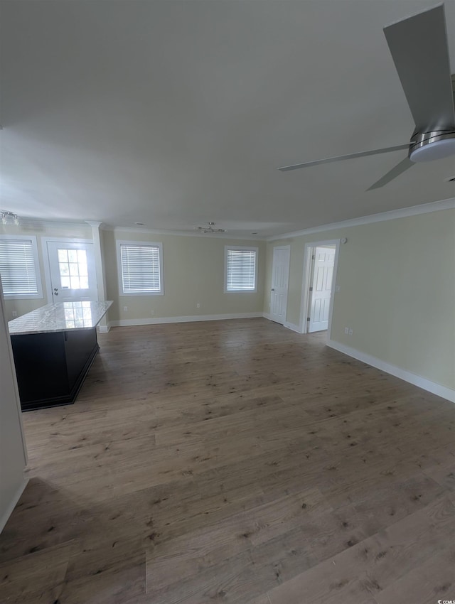 880 Briarwood Dr, Myrtle Beach, SC 29572 - unfurnished living room with crown molding, ceiling fan, and light wood-type flooring