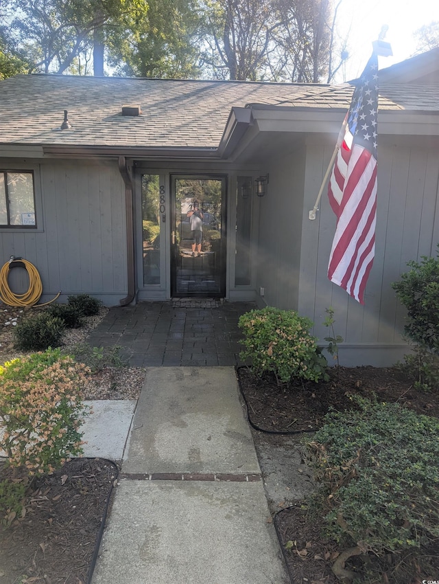 880 Briarwood Dr, Myrtle Beach, SC 29572 - entrance to property with a shingled roof