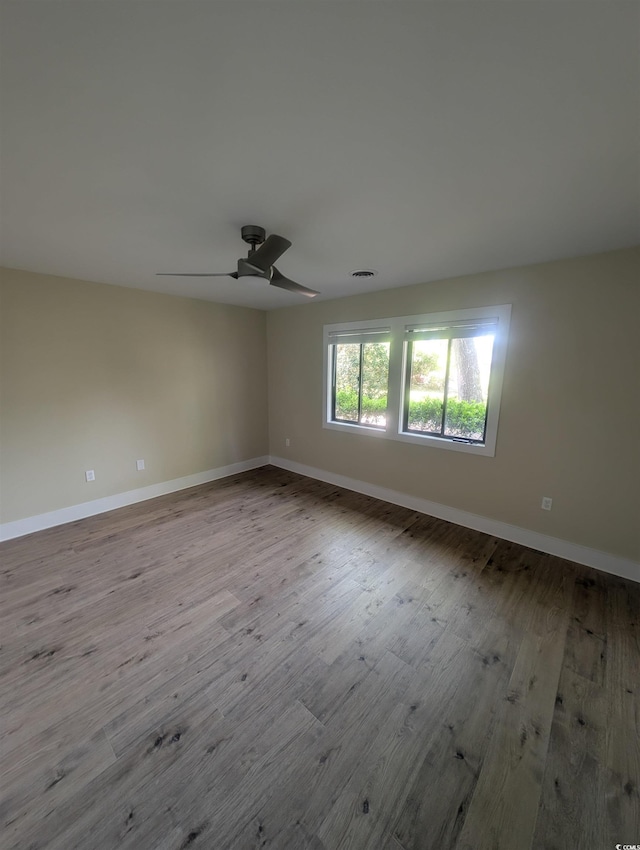 880 Briarwood Dr, Myrtle Beach, SC 29572 - empty room featuring a ceiling fan and wood finished floors