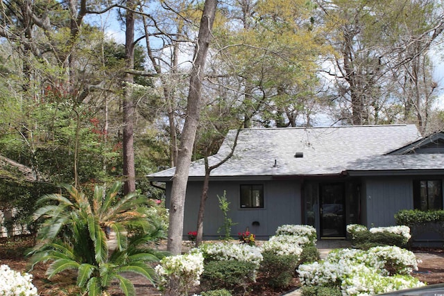 880 Briarwood Dr, Myrtle Beach, SC 29572 - view of side of property featuring roof with shingles