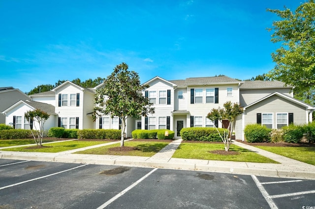 121 Olde Towne Way Unit 2, Myrtle Beach, SC 29588 - view of property with a front lawn and uncovered parking