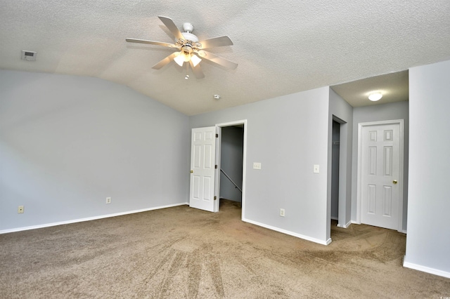 121 Olde Towne Way Unit 2, Myrtle Beach, SC 29588 - carpeted spare room with baseboards, a ceiling fan, a textured ceiling, and vaulted ceiling