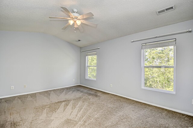 121 Olde Towne Way Unit 2, Myrtle Beach, SC 29588 - unfurnished room with visible vents, a ceiling fan, carpet, and a textured ceiling