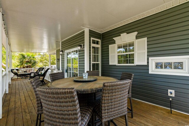 6001-8050 S Kings Hwy, Myrtle Beach, SC 29575 - deck with outdoor lounge area, outdoor dining space, and covered porch