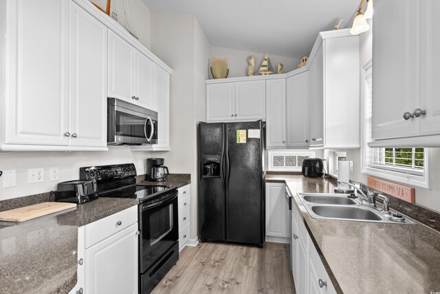 6001-8050 S Kings Hwy, Myrtle Beach, SC 29575 - kitchen with vaulted ceiling, a sink, white cabinetry, and black appliances