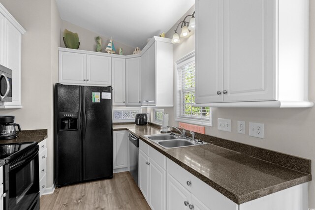6001-8050 S Kings Hwy, Myrtle Beach, SC 29575 - kitchen with black appliances, dark countertops, a sink, and white cabinets