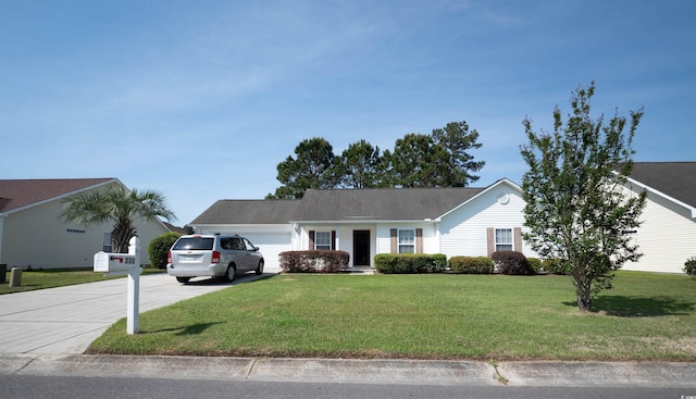 331 Andorra St, Longs, SC 29568 - ranch-style house with concrete driveway, a garage, and a front lawn