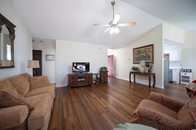 331 Andorra St, Longs, SC 29568 - living area with vaulted ceiling, dark wood-style flooring, a ceiling fan, and baseboards