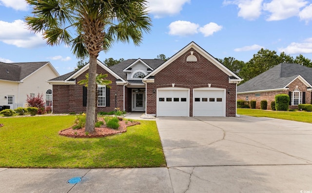 traditional-style home with an attached garage, concrete driveway, a front yard, and brick siding