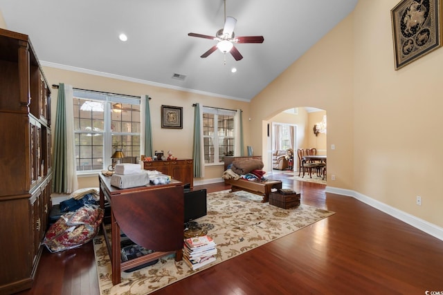office space featuring arched walkways, visible vents, a ceiling fan, and a healthy amount of sunlight