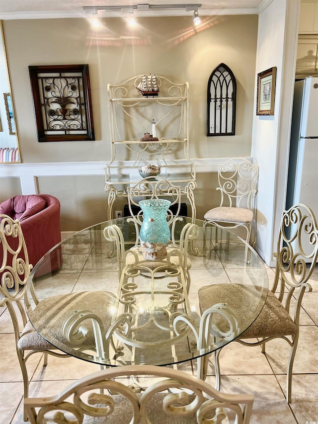 6000 Ocean Blvd N Unit 108, North Myrtle Beach, SC 29582 - tiled dining room with ornamental molding