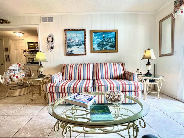 6000 Ocean Blvd N Unit 108, North Myrtle Beach, SC 29582 - living room with crown molding, light tile patterned flooring, and a textured ceiling