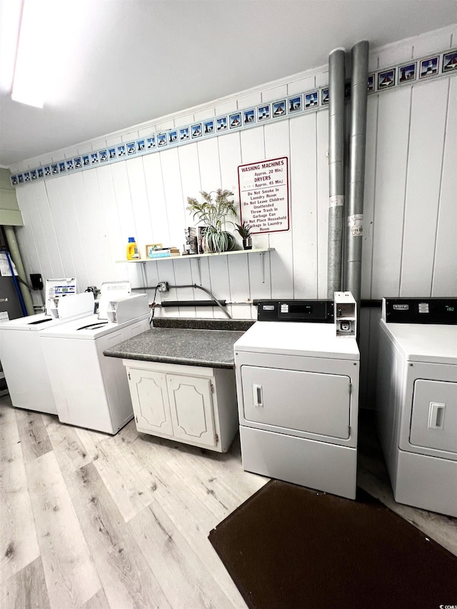 6000 Ocean Blvd N Unit 108, North Myrtle Beach, SC 29582 - shared laundry with washer and clothes dryer and light wood-type flooring
