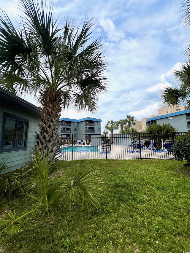 6000 Ocean Blvd N Unit 108, North Myrtle Beach, SC 29582 - view of yard with a community pool