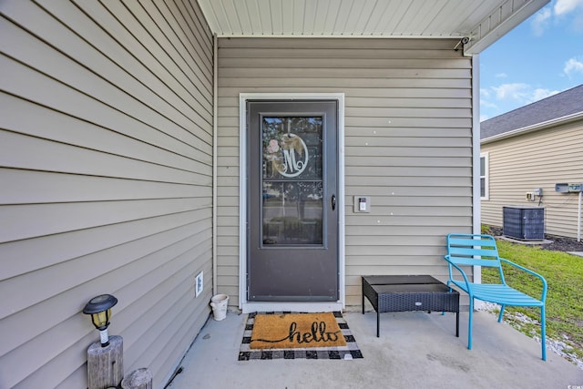 entrance to property featuring central air condition unit