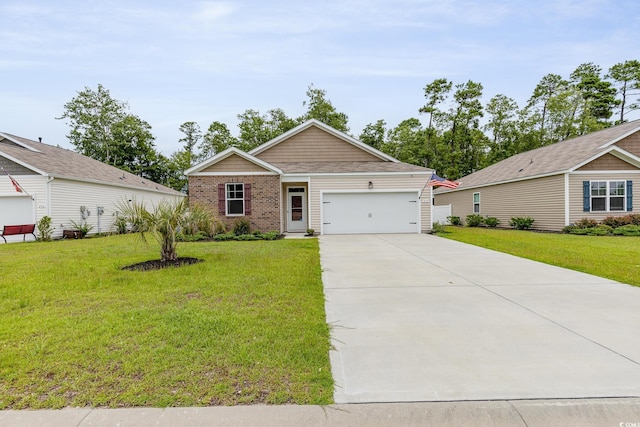view of front of house featuring a front lawn, driveway, an attached garage, and brick siding