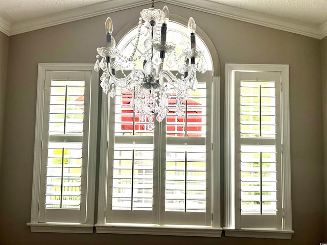1516 Saint George Ln, Myrtle Beach, SC 29588 - interior details with ornamental molding, a textured ceiling, and a chandelier