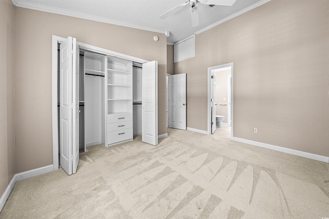 1516 Saint George Ln, Myrtle Beach, SC 29588 - unfurnished bedroom with connected bathroom, ceiling fan, light carpet, baseboards, and ornamental molding
